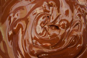Geschmolzene Schokolade für leckere selbstgemachte Gerichte